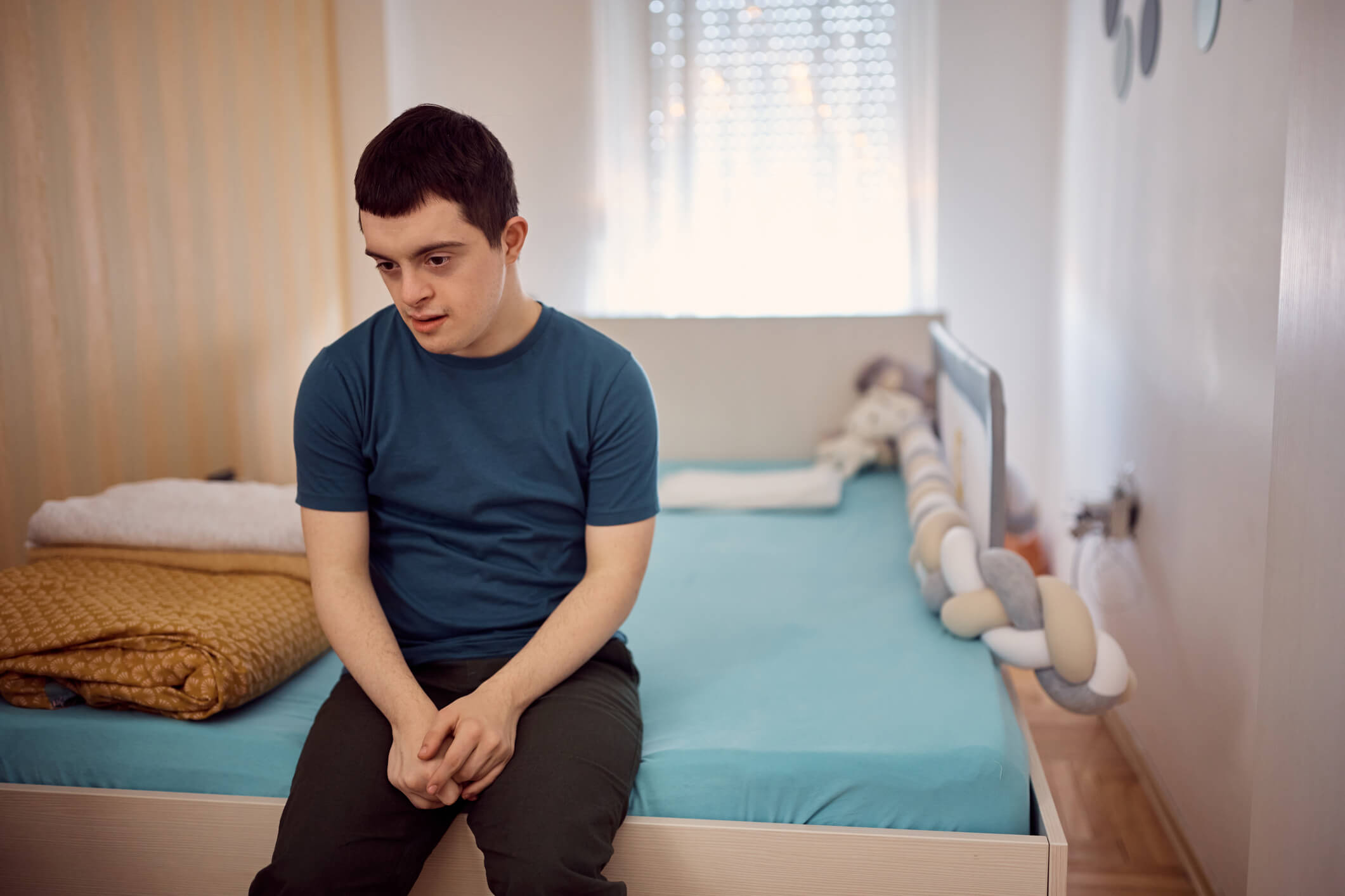 Boy with IDD thinking about life goals